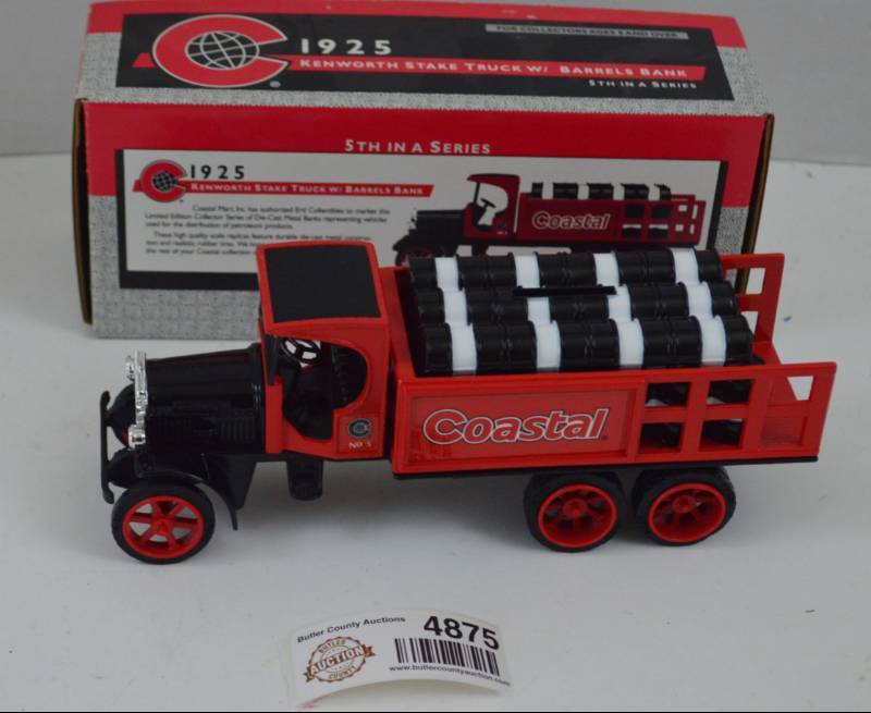 lot 4875 image: Coastal 1925 Kenworth Stake Truck w Barrels Bank 5th In A Series