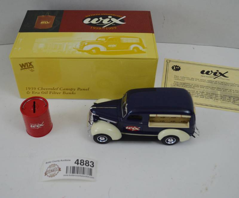 lot 4883 image: Wix 1939 Canopy Panel & Era Oil Filter Banks 16th Anniversary Die Cast Car