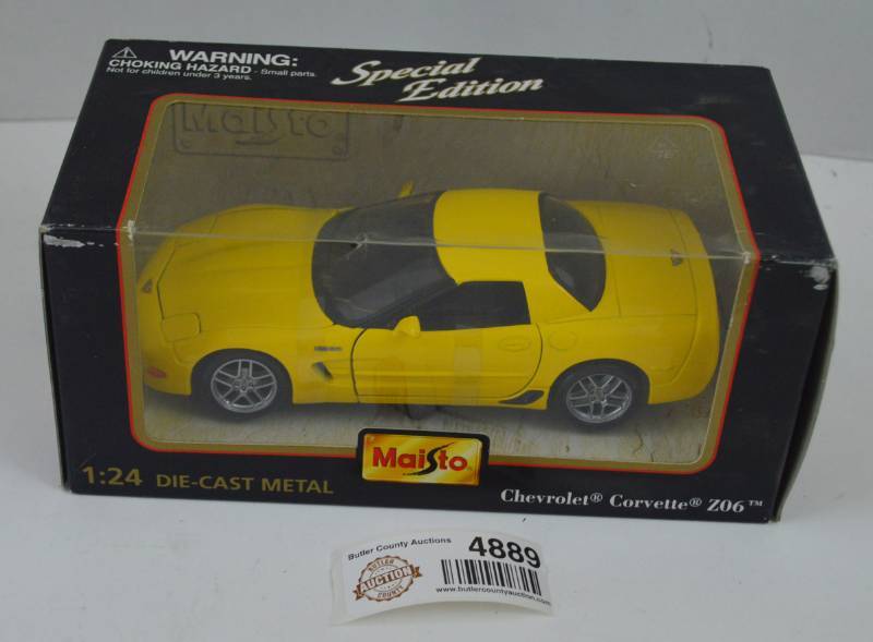 lot 4889 image: Maisto 124 Corvette Z06 Die Cast Car (Yellow)