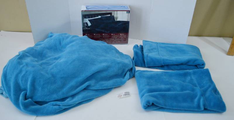 lot 4955 image: New In Package Blue Satin Sheet Set and Super Soft Fitted Sheet W 2 Pillow Cases (Appears Queen Sized)