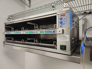 lot 17834 image: Prince Castle Dedicated Holding Bin (Model DHB2SS-33SNC) and Mounted Shelf