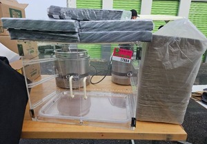 lot 17884 image: Assorted Lot W Clear Display Case, Black Check Sandwich Wrap Paper, and Serving Trays