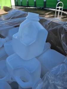 lot 17914 image: Bulk Lot of Quart Sized Plastic Water Jugs