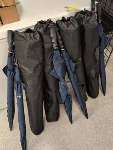 lot 20 image: Navy Blue Golf Umbrellas and Black Lawn Chairs  - Retail $160
