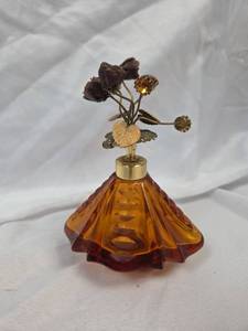 lot 831 image: Amber Glass Perfume Bottle with Floral Topper