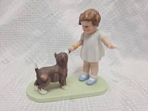 lot 958 image: Bessie Pease Gutmann The Reward Porcelain Figurine