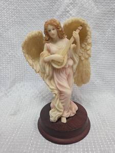 lot 961 image: Angel Figurine on Wooden Base