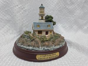 lot 981 image: Thomas Kinkade A Light in the Storm Lighthouse Sculpture