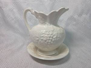 lot 1808 image: White Porcelain Floral Pitcher with Saucer