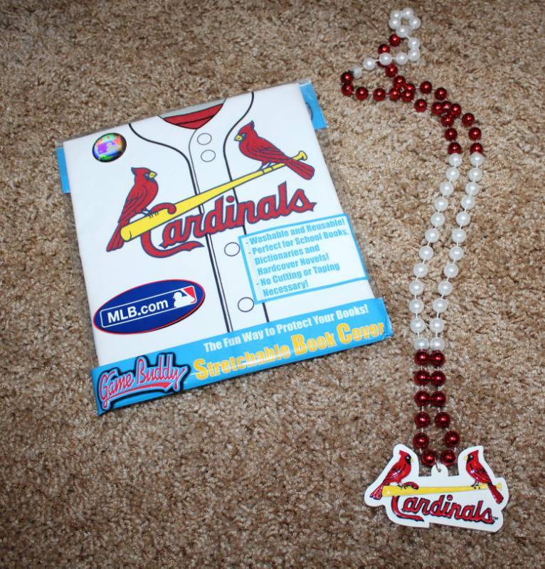 lot 2071 image: Cardinals Book Cover And Necklace