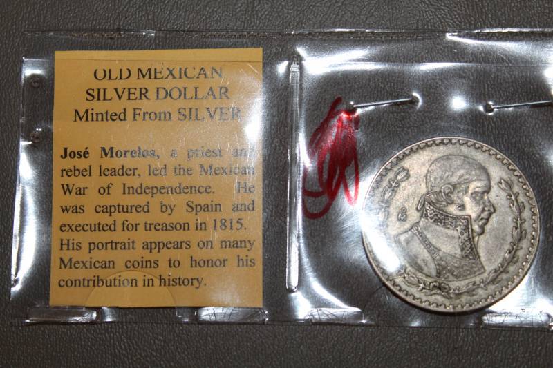 lot 2104 image: Old Mexican Silver Dollar