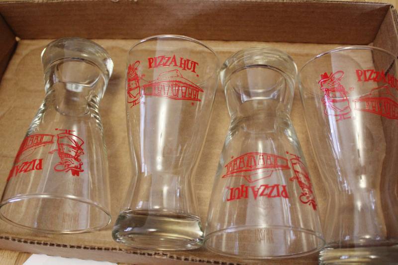 lot 1096 image: Lot of 4 Pizza Hut Pete Pilsner Glasses