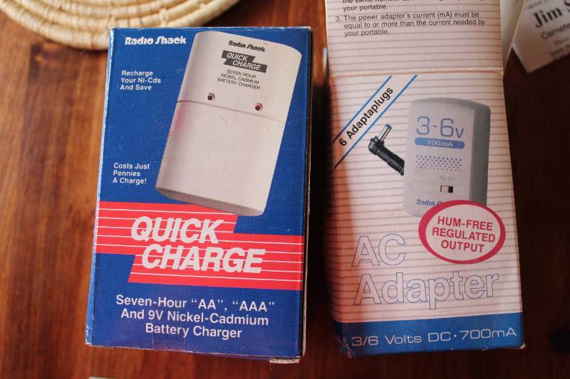 lot 1117 image: Battery Charger and Adapter