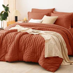 lot 2264 image: CozyLux Queen Comforter Set Burnt Orange Seersucker 7 Pieces Bed in a Bag Queen Comforter Set with Sheets Terracotta Luxury Bedding Set with Down Alternative Comforter, Sheets, Pillowcases & Shams