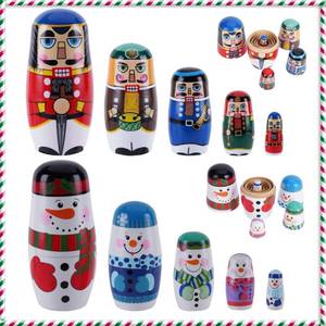 lot 2305 image: Tngan Chirstmas Russian Nesting Dolls, 2 Pack Wooden Handmade Nested Set Matryoshka Dolls, Russian Stacking Dolls Toys for Kids Toddlers Happy Chirstmas Home Decoration Gift(Snowman Nutcracker)