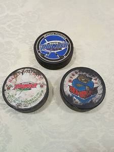 lot 1 image: CHL and Wichita Thunder Hockey Puck Collection