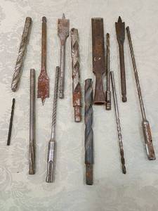lot 21 image: Collection of Early Drill Bits and Tool Attachments