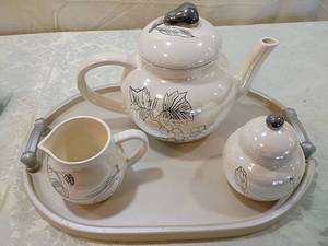 lot 49 image: White Ceramic Double Creamer Set with Leaf Design with wood tray with large ceramic  tea kettle