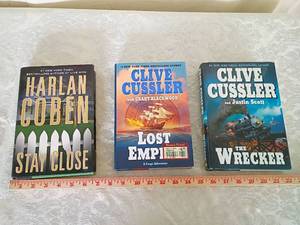 lot 51 image: Three Hardback Books -Lost Empire, The Wrecker, and Stay Close