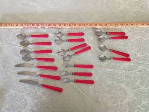 lot 56 image: Red Handle Flatware Set