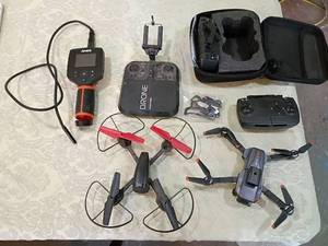 lot 119 image: Aerial Drone One Complete Kit(missing battery) with AMES Camera doesnt power up Sharp image drone never messed with it. Parts parts