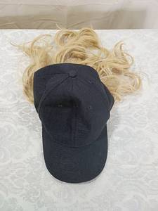 lot 142 image: Baseball Cap with Attached Blonde Hair Wig