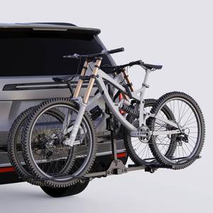 lot 221263 image: Retails for $130 TANX Bike Racks for Ebikes,Fat Tire Bike Rack for Tow Hitch 2-Bike 160 lbs Capacity,Hitch Bike Rack for Heavy E Bike, Wobble Free Smart Tilting Folding Bicycle Car Racks for Standard, 2 inch Receiver