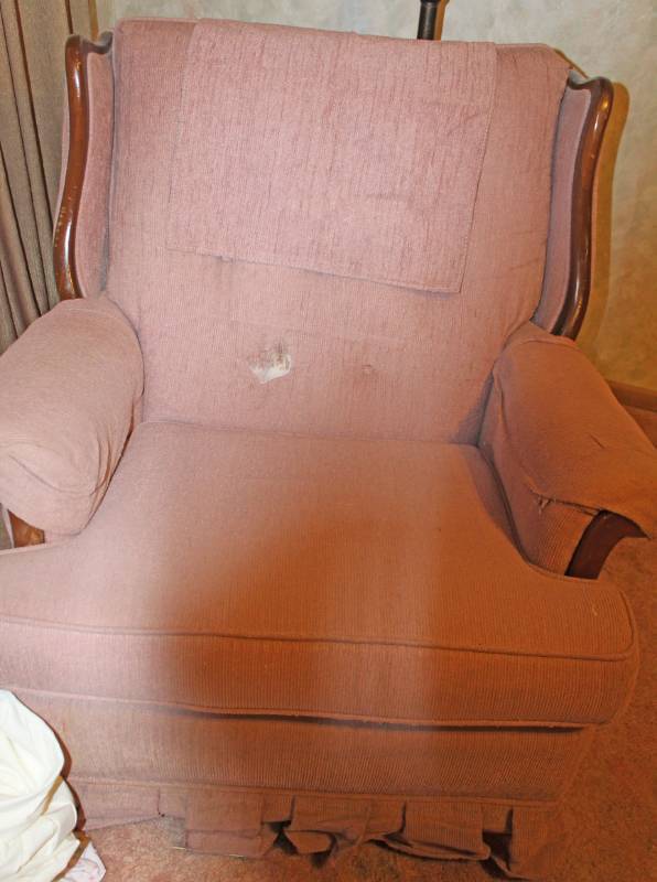 lot 1549 image: Pink Swiveling Rocker Chair - Fabric Frayed Slightly