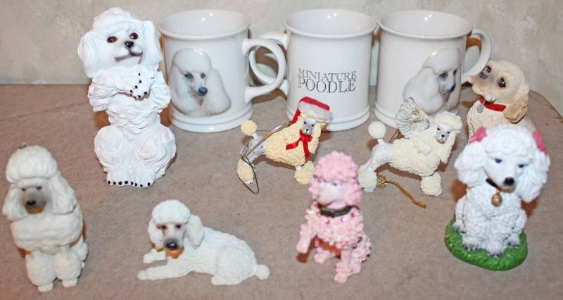 lot 1605 image: Oodles of Poodles Collectible Figurines and Mugs