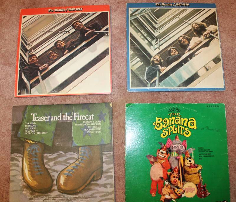 lot 1617 image: Four Records 2 Beatles