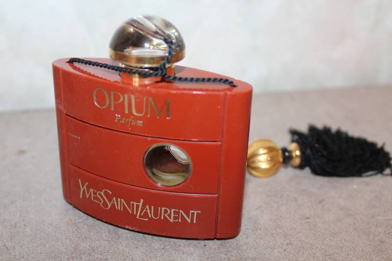 lot 7925 image: Yves Saint Laurent Perfume Bottle