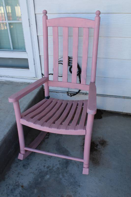 lot 7934 image: Outdoor Rocking Chair - Relax on the porch