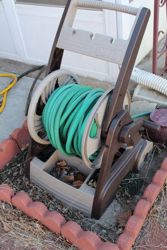 lot 7935 image: Hose Reel with Hose
