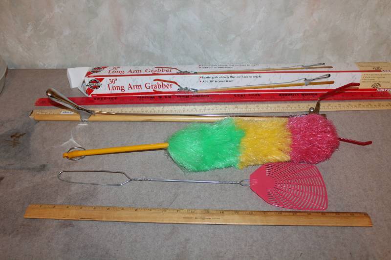 lot 7973 image: Arm Grabber, Meter Sticks, Duster, Fly Swatter and Trash Can