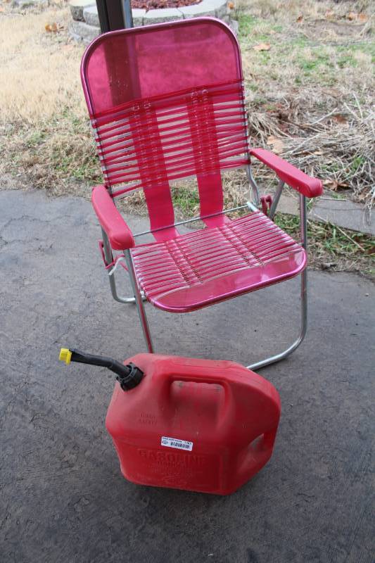 lot 1763 image: Gas Can (5 gallon) and Lawn Chair