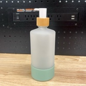 lot 906 image: Refillable Glass Soap Dispenser  - Retail $0
