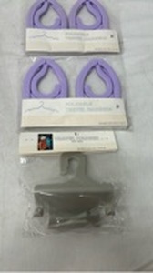 lot 7291 image: Purple Foldable Travel Hangers Set