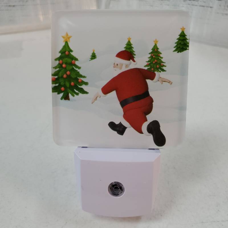 lot 54357 image: Christmas Night Lights Plug into Wall Santa Claus Running on The Snowfield LED Nightlights Dusk to Dawn for Living Room, Bedroom, Bathroom, Kitchen, Hallway, Stairways, Funny Xmas Night Light - Retail $10