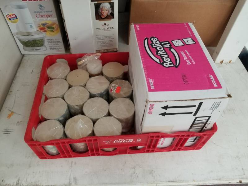 lot 5390 image: Case of 12 cans of Gum Remover and 14 pillar candles