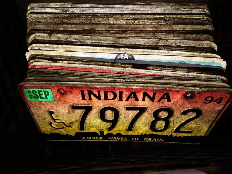 lot 5432 image: Milk Crate Full of Vintage License Plates