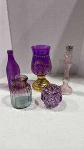 lot 1069 image: Purple glass bottle and candle holders