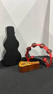 lot 1091 image: Red Tambourine with Wooden Inlay Guitar Box and  Mini Guitar Case
