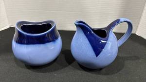 lot 1095 image: Blue Gradient Ceramic Creamer Set