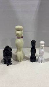 lot 1114 image: Glow in the Dark Avon Glass Poodle and other Poodle Figurines