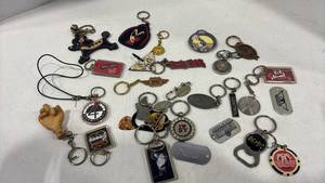 lot 1151 image: Rock Band Music Memorabilia Keychain Collection