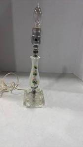 lot 1176 image: Porcelain floral with glass base lamp, no shade 16 inches tall