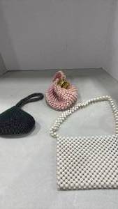 lot 1202 image: Beaded hand bags