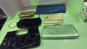 lot 1205 image: Clutch purses and more