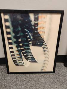 lot 1831 image: Wall Decor.  Framed 35mm Film Strip Art. 21 x 17