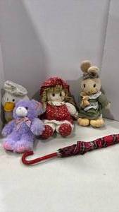 lot 2067 image: Stuff animals, raggedy Ann doll and kid size umbrella
